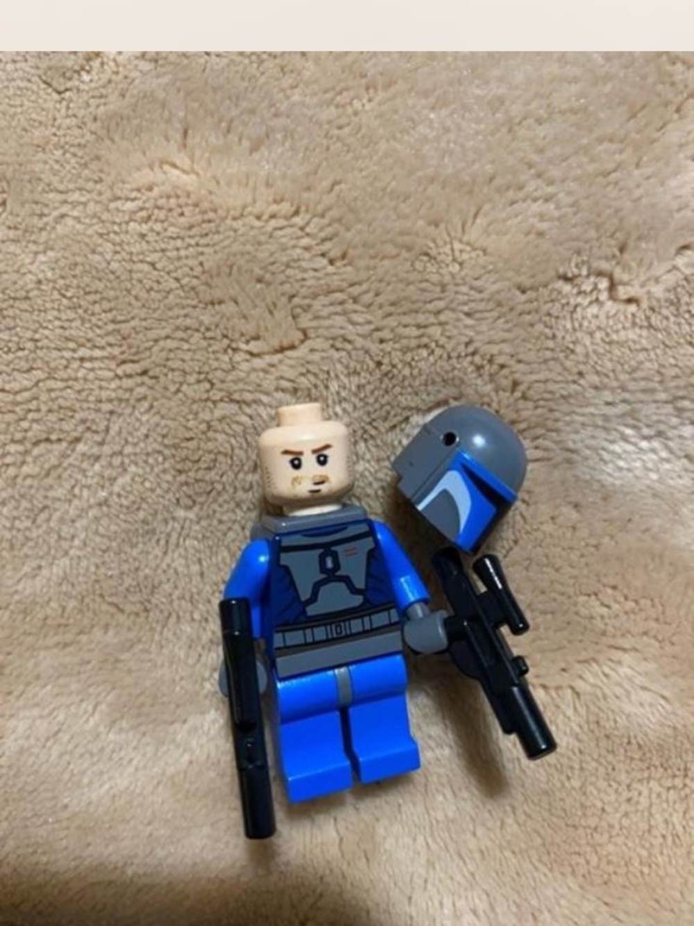 Lego Blue Mandalorian Minifigure with Gray Helmet and Black Blasters